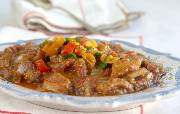 Spicy pork stew with salsa cruda